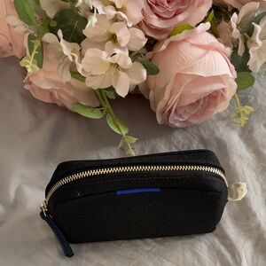 The Mini Universal Pouch-$69